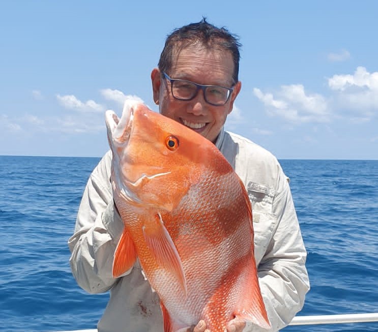 Jimmy Shu with fish